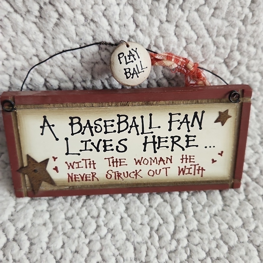 MLB A Baseball fan lives here with a woman. He never struck out with. De…